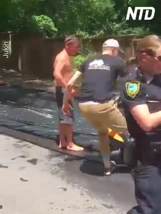 Police Officer Rides Slip and Slide with Kids