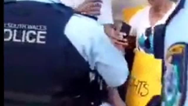 Australia CovidTyranny - 12 - Woman w terrified child crying gets arrested. Evil!