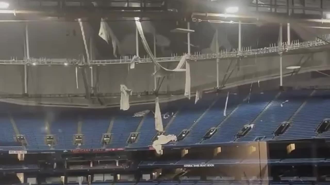 The American flag flies strong as the roof was torn down at Tropicana Field in Tampa