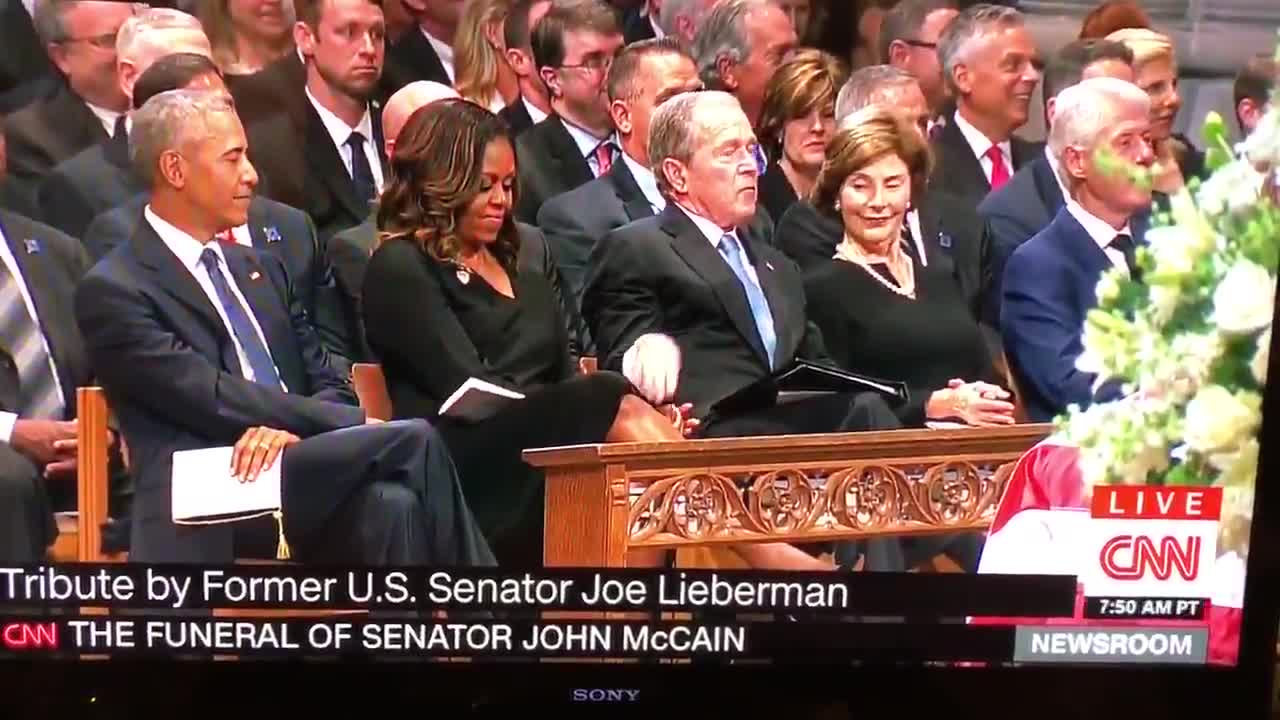 George W. Bush Slips Candy To Michelle Obama