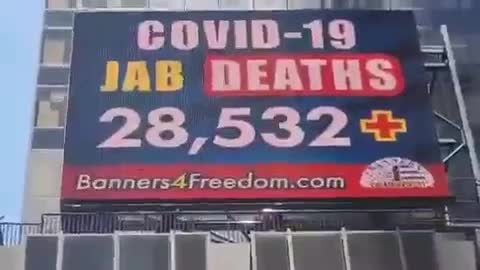Jab deaths & injuries billboard in NY city
