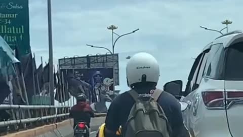 angry couple on motorbike until jatuh