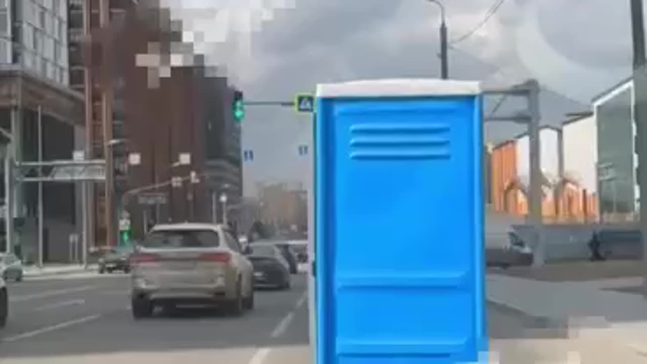 Imagine having to use a porta potty and end up dodging traffic