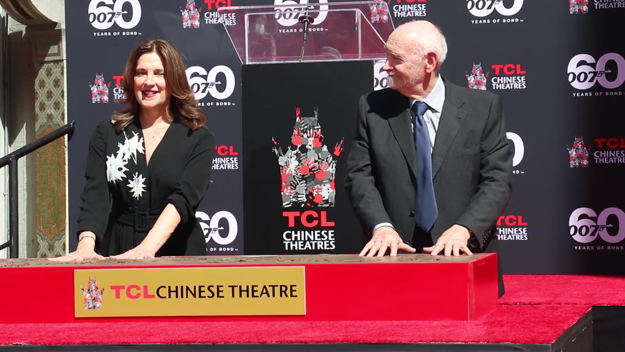 Michael G. Wilson and Barbara Broccoli place their Handprints in Cement