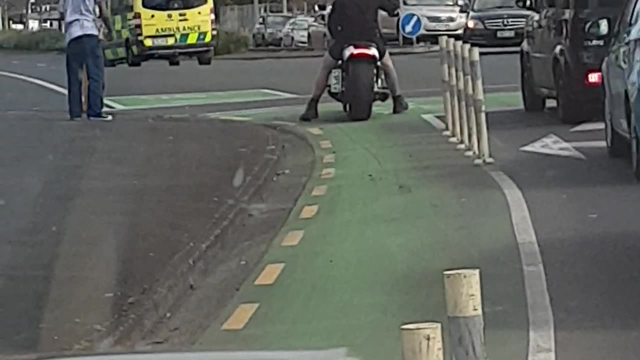 Biker Gets His Helmet Cleaned