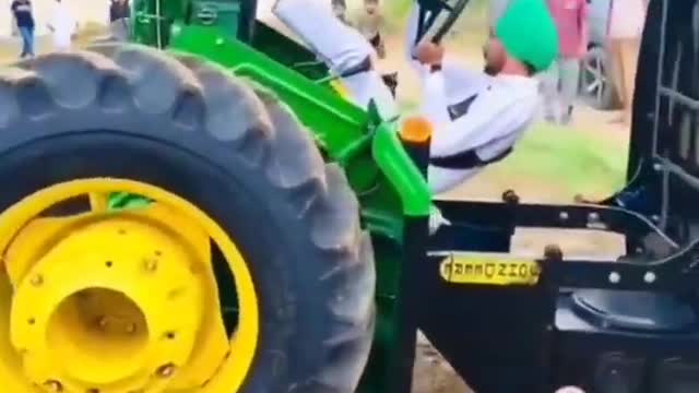 Amazing feat on tractor of Indian farmer