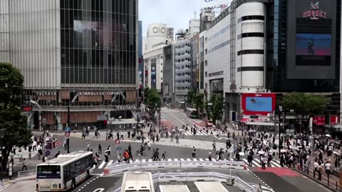 Japan PM purges cabinet after financial scandal