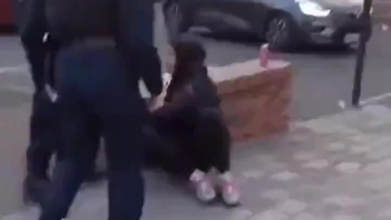 In France a man is harassing a woman police officer & gets a slap from a