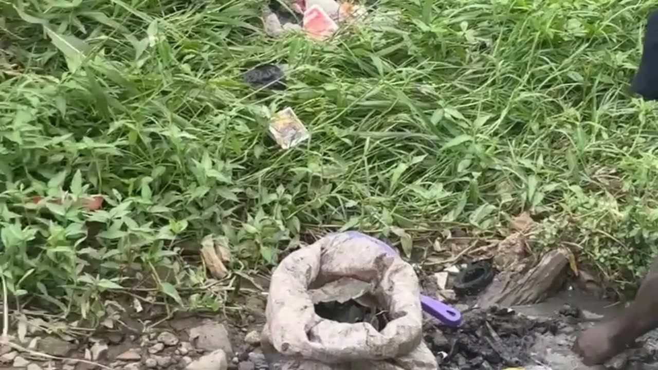 Nigerian man picks nails from the gutter to survive everyday!😔