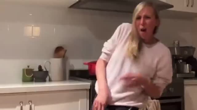 Dancing with Bulldog in Kitchen Leads to Unexpected Bite