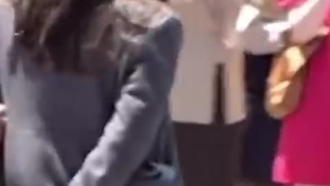 AOC pretends to wear handcuffs