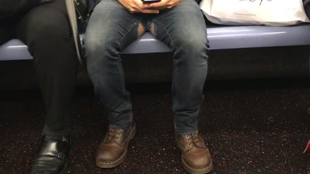 Man with tears on the inside of his jeans