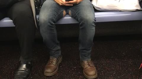 Man with tears on the inside of his jeans