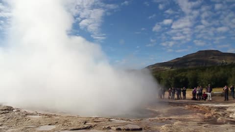 Tourist Awaiting Strokkur Eruption