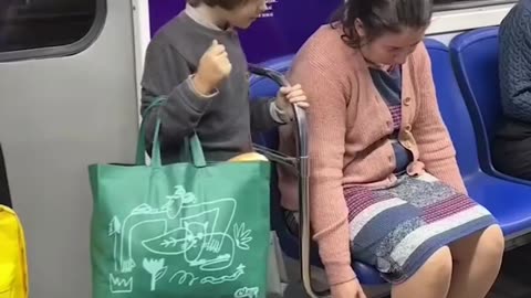 Son taking care of his tired mom