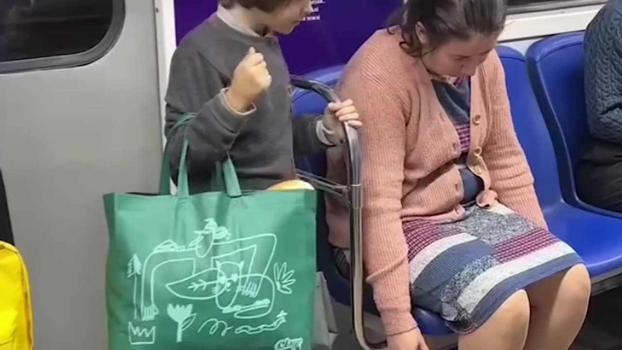 Son taking care of his tired mom