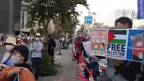 Pro-Palestinian protesters gather outside the Israeli embassy in Tokyo, Japan