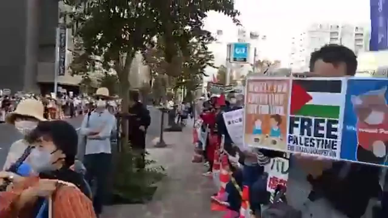 Pro-Palestinian protesters gather outside the Israeli embassy in Tokyo, Japan