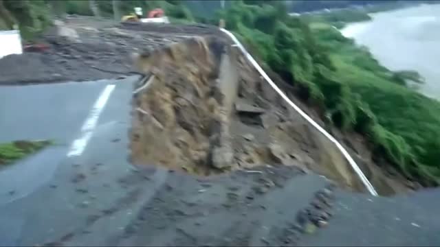 Landslide sweeps away road in Japan typhoon 1 | News