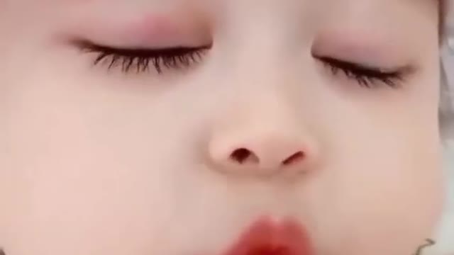 Cute baby kissing