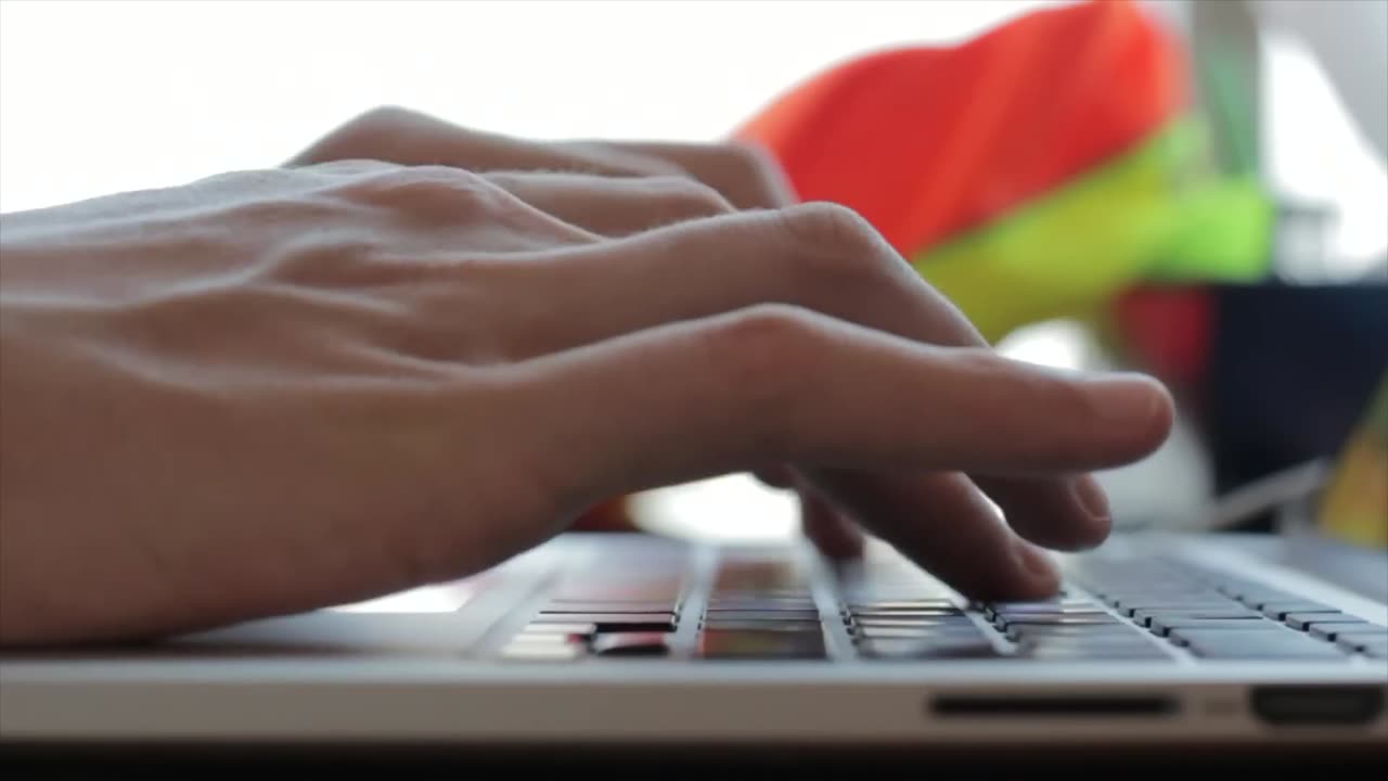 Male Hands Typing On Notebook