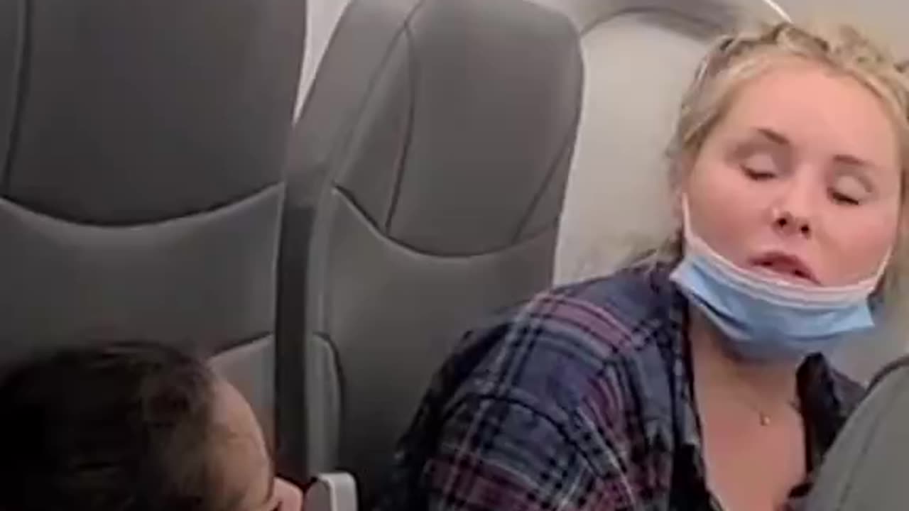 A mom and her sleeping kids were kicked off a plane for asking about a delay