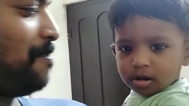 Baby reaction and imitation to dad