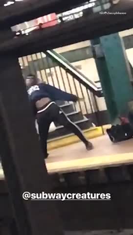 Guy bounces on butt and kicks legs dances in subway