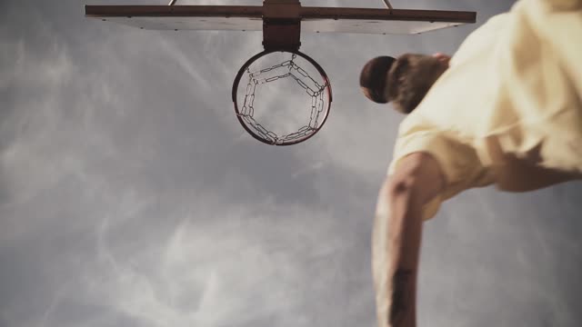 Man Playing Basketball