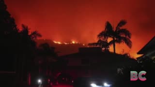 Wildfire explodes in Malibu