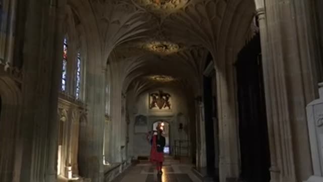 The Queen’s Piper plays a lament from the North Quire Aisle,