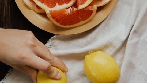 Cutting Lemon into Slices Using a Knife