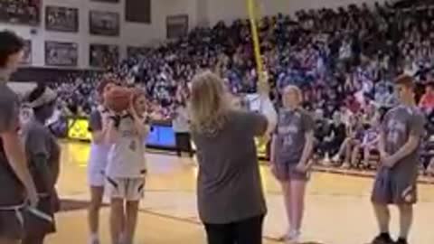 A student with blindness sunk a basket at high school