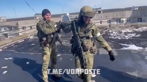 Chechen battalion in Lezginka on the roof of a residential building,