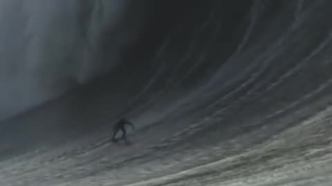 Astonishing footage of surfer Mason Hyce Barnes riding an enormous wave off