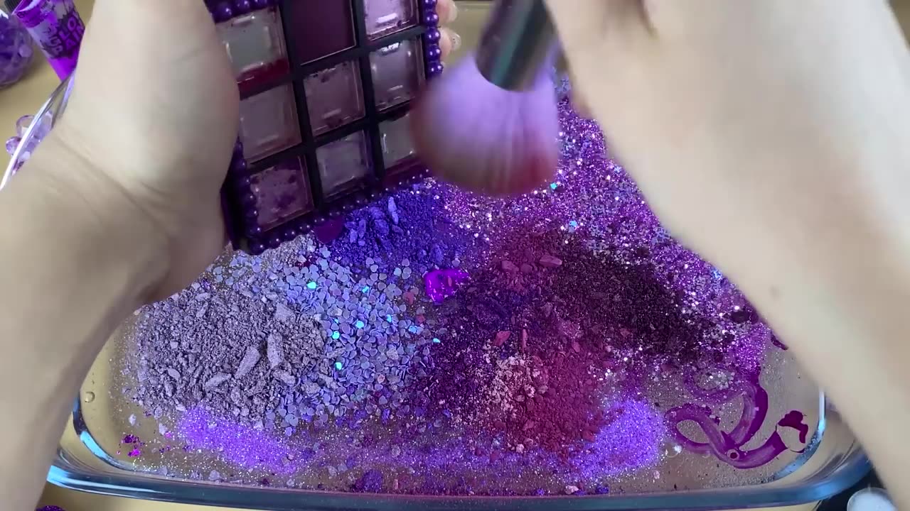 PURPLE SLIME! Mixing makeup and glitter into clear slime