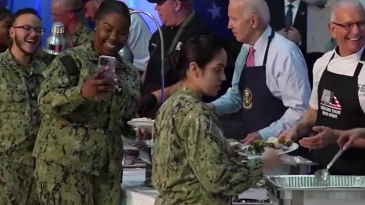 President Joe Biden, serving food