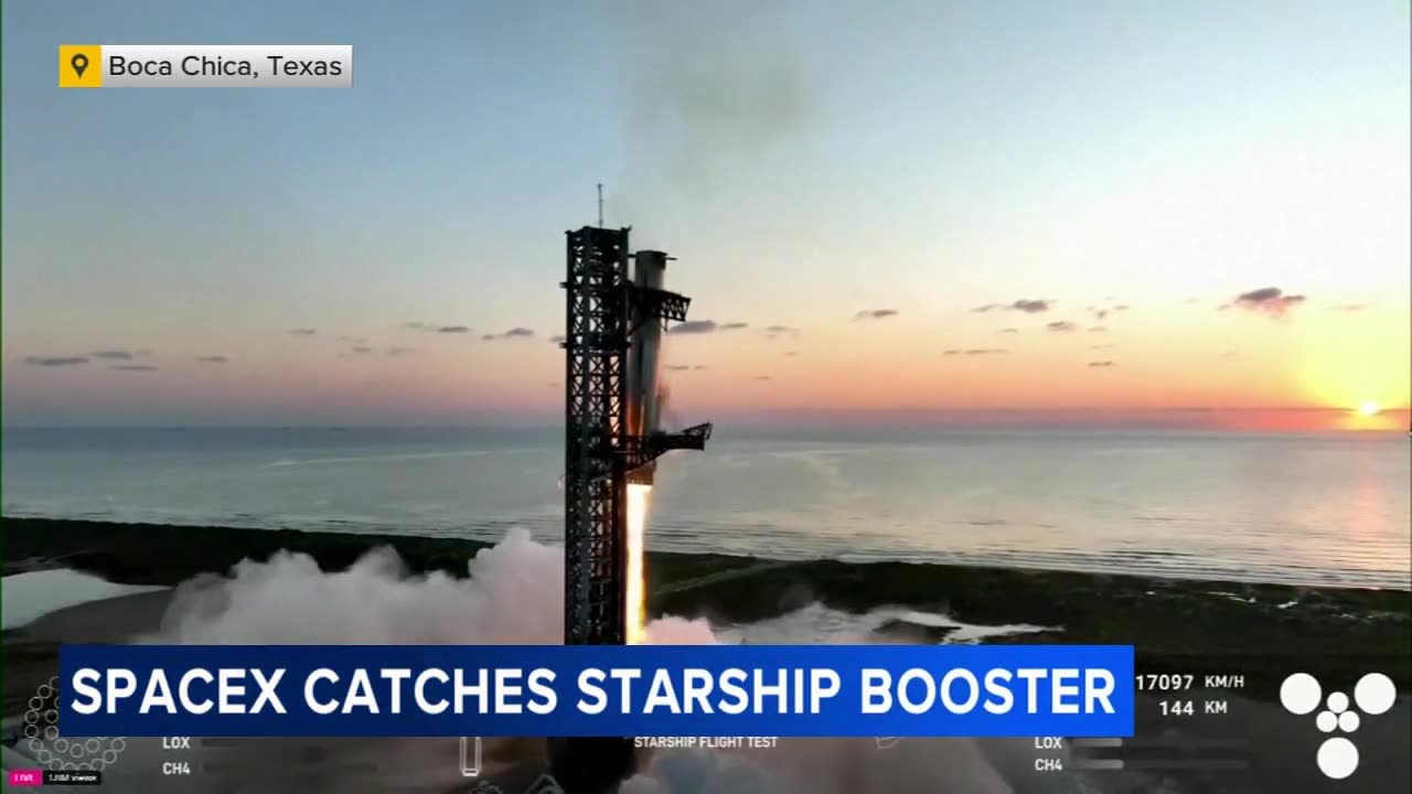 Mechanical SpaceX arms catch Starship rocket booster at landing pad