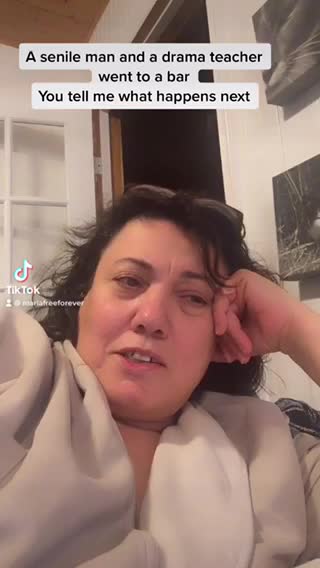 A smile man and drama teacher meat at the bar