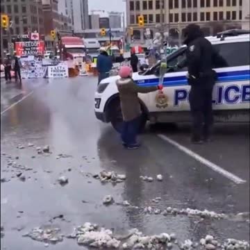 Little Terrorist Truckers Child gives Flower to Police Officer - Enact Martial Law