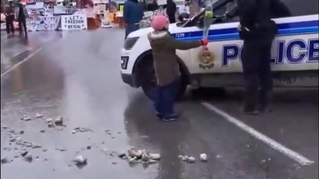 Little Terrorist Truckers Child gives Flower to Police Officer - Enact Martial Law