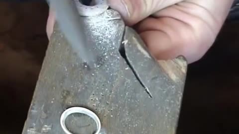 Cut The Pattern On The Surface Of The Silver Sheet