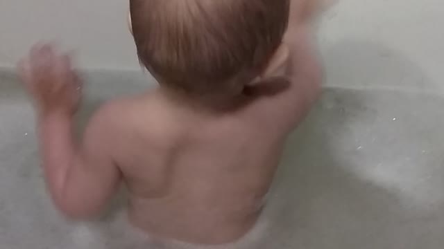 Kid playing with foam