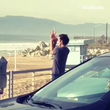 Guy does meditation poses at the beach, flute music