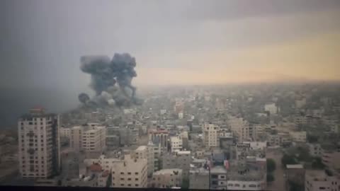 Israeli Airstrikes just now near the Shore in Central Gaza causing a Large Explosion