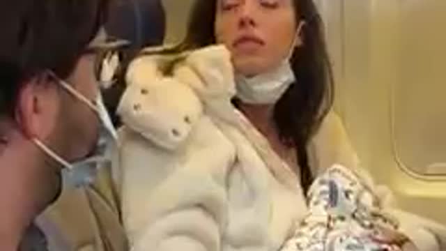 Feeding a baby on airplane