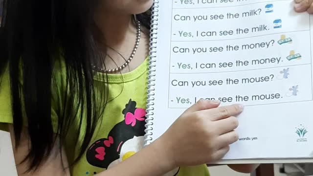 Very cute little girl learning English