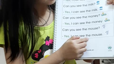 Very cute little girl learning English