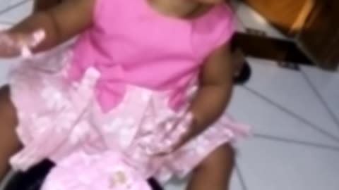 baby playing with cake
