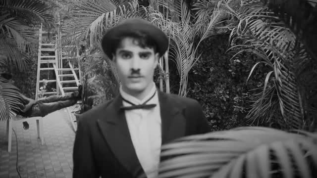 Charlie Chaplin trying 2 impress a girl